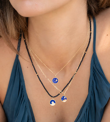 Close-up of the pavé diamond full moon on the Mountain Moonrise pendant